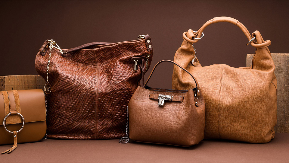 A selection of brown leather handbags