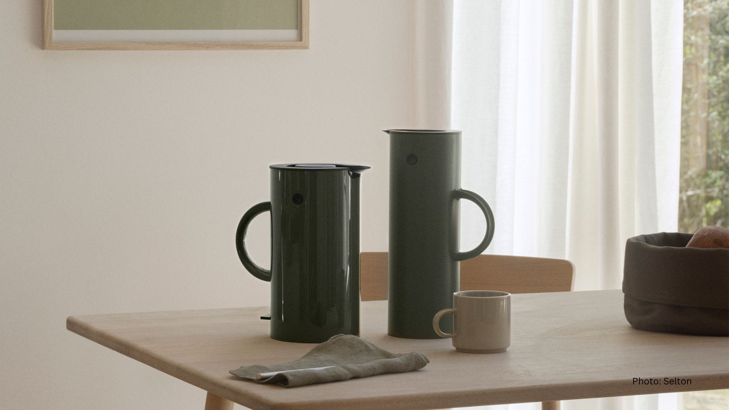 Two jugs on a table