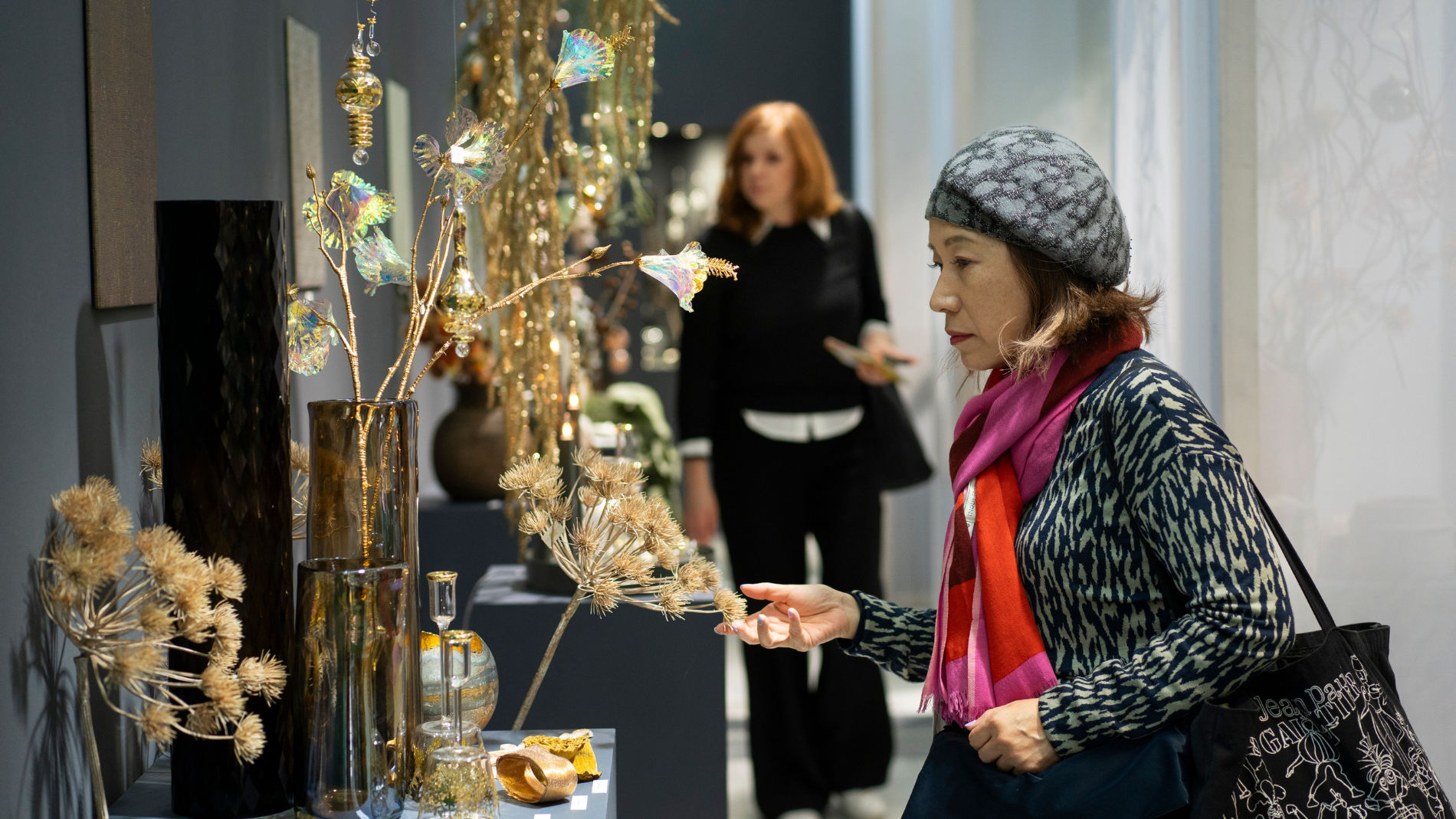 Woman looking at Christmas decorations