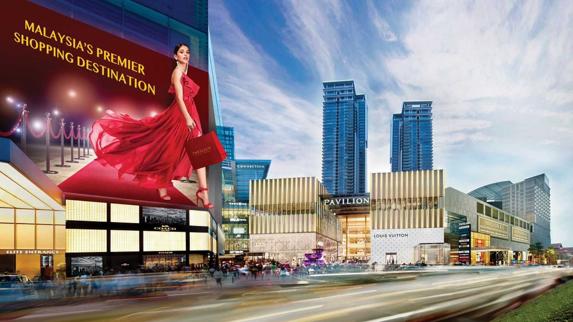 Pavilion Kuala Lumpur, one of Malaysia’s premier shopping destinations, featuring modern façades and a large luxury fashion billboard.
