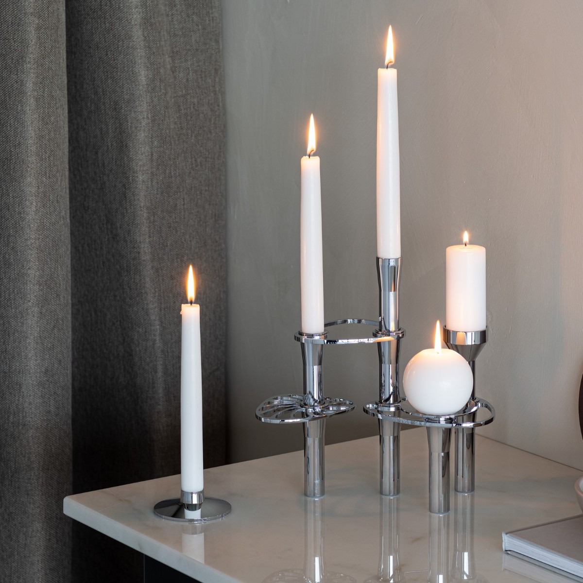 The ‘Curve’ candle holder collection by Lind DNA