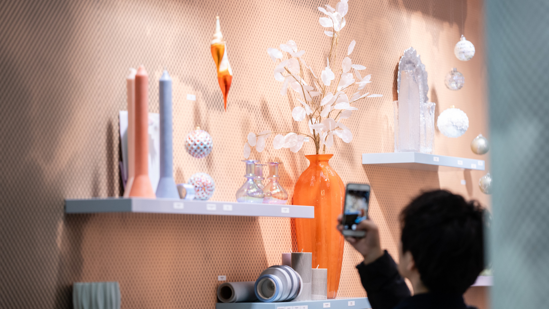 One person in front of a window display stand