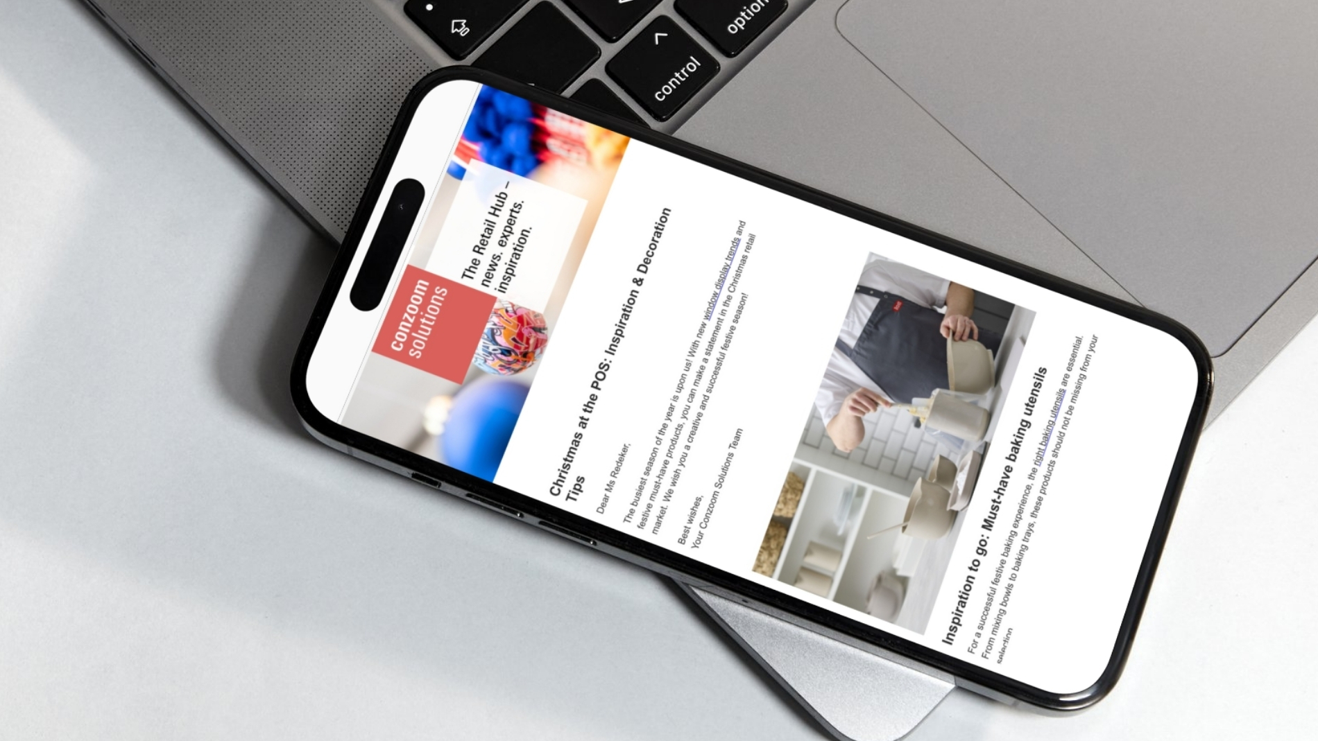 Conzoom Solutions newsletter on a mobile phone